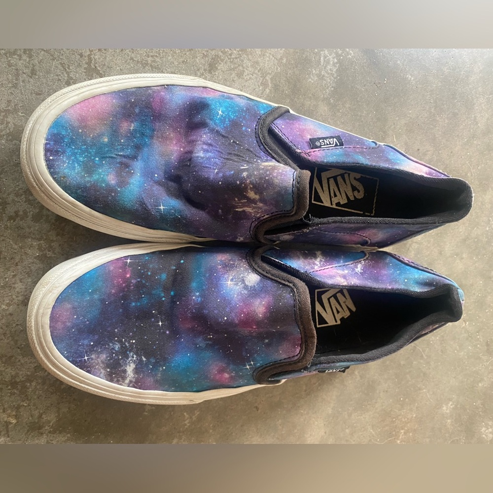 Galaxy Vans slip-ons